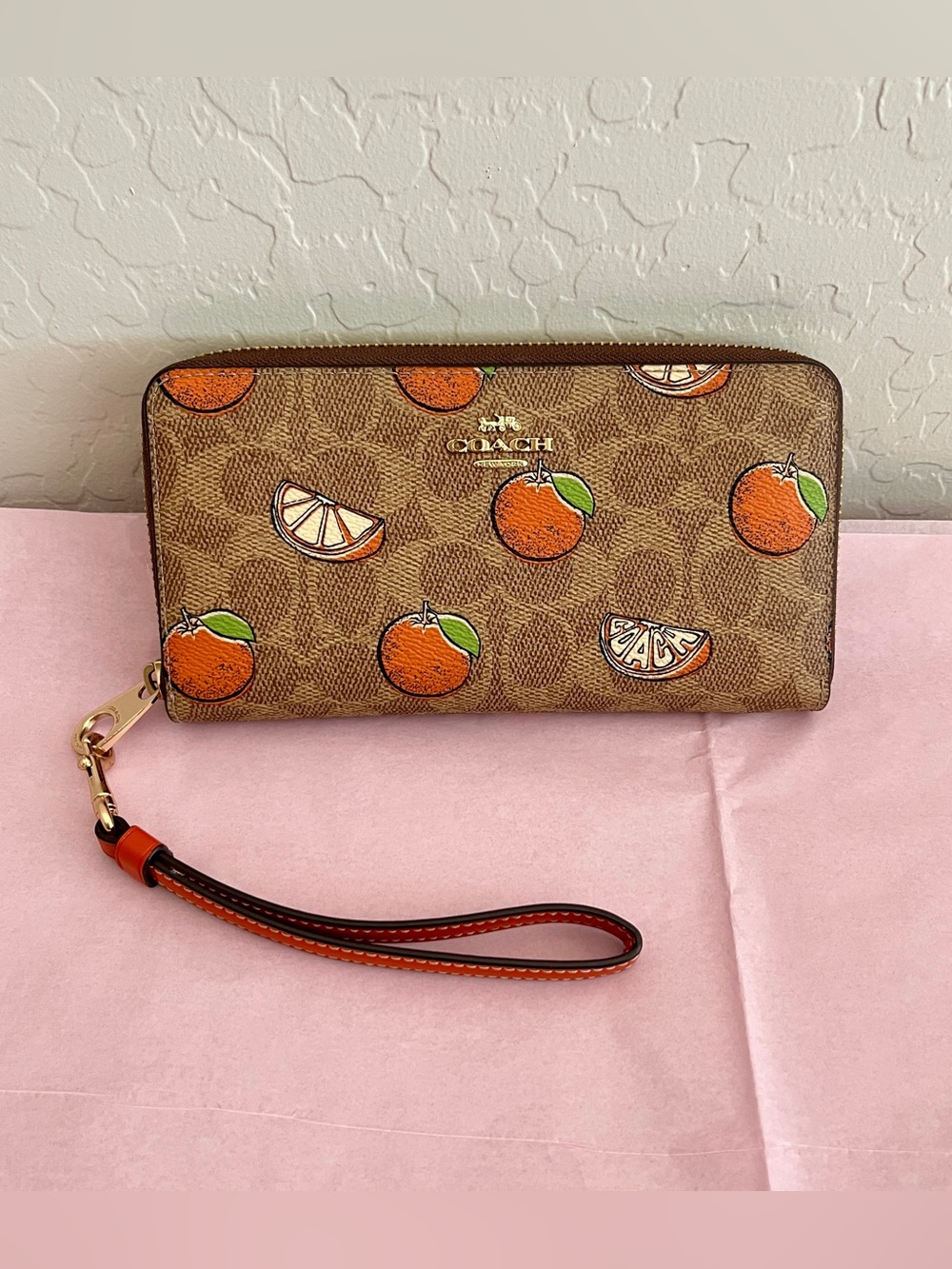 Coach Brown Signature Long Zip Around Wallet with Orange Fruit Print